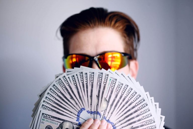 Cool guy with dollards in hand
